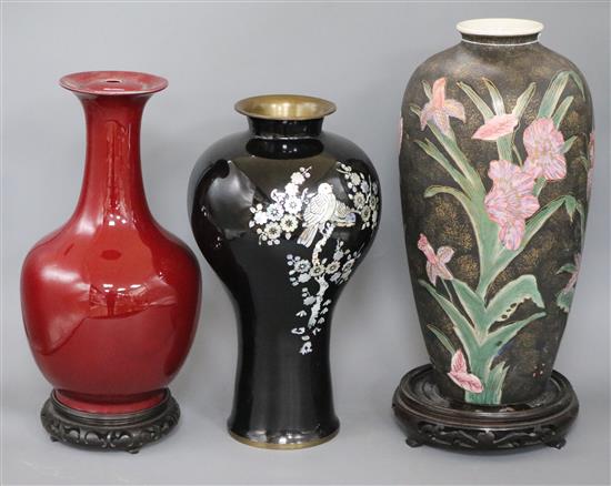 A Japanese mother of pearl enamel vase, a floral vase and another on stand tallest 35cm